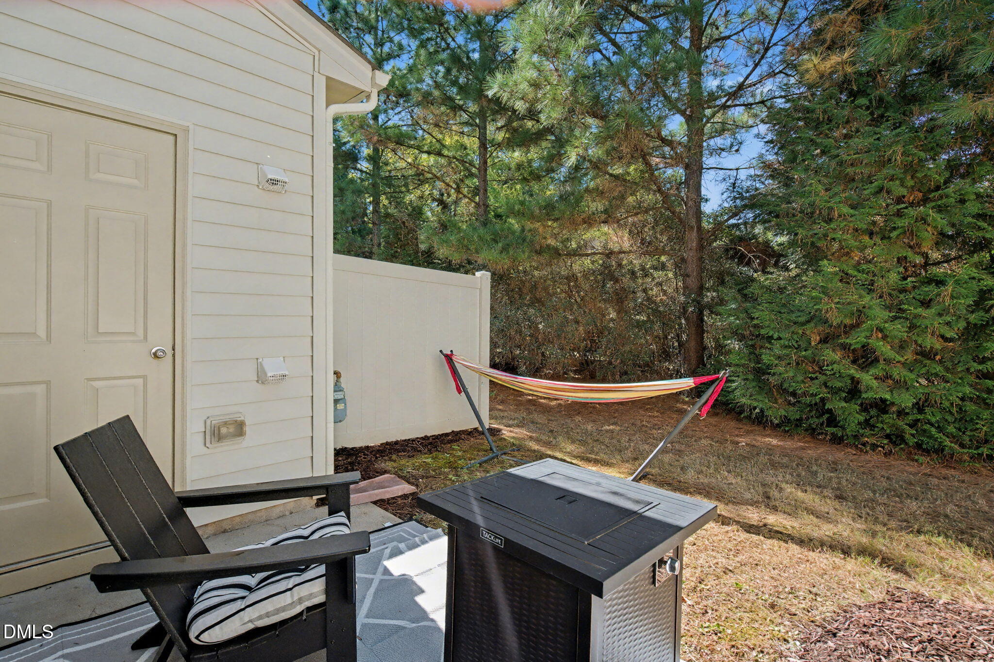 6321 Pesta Court Raleigh, NC 27612 - Photo 22 of 26 a view of outdoor sitting area with furniture