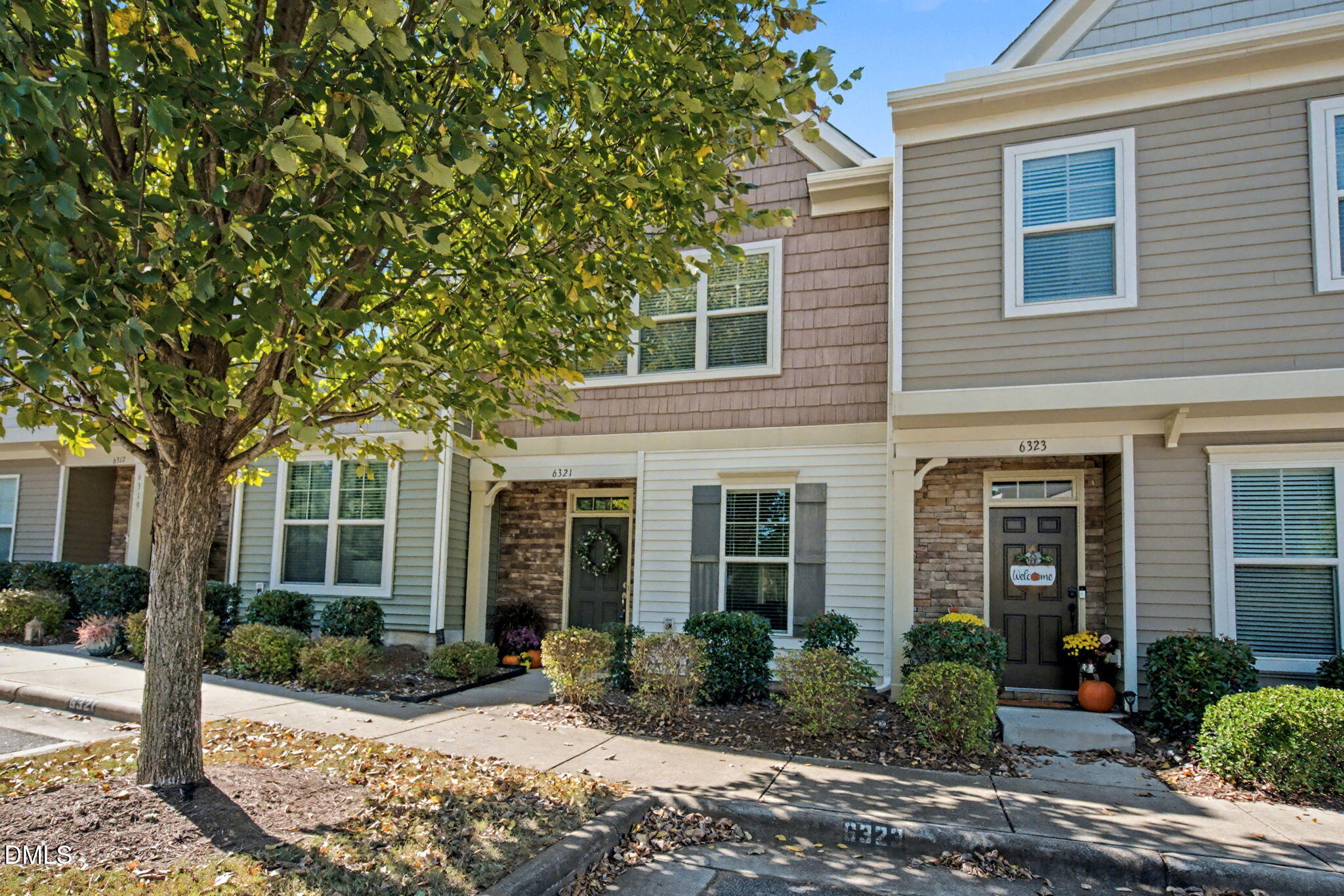 6321 Pesta Court Raleigh, NC 27612 - Photo 2 of 26 a front view of a house with garden