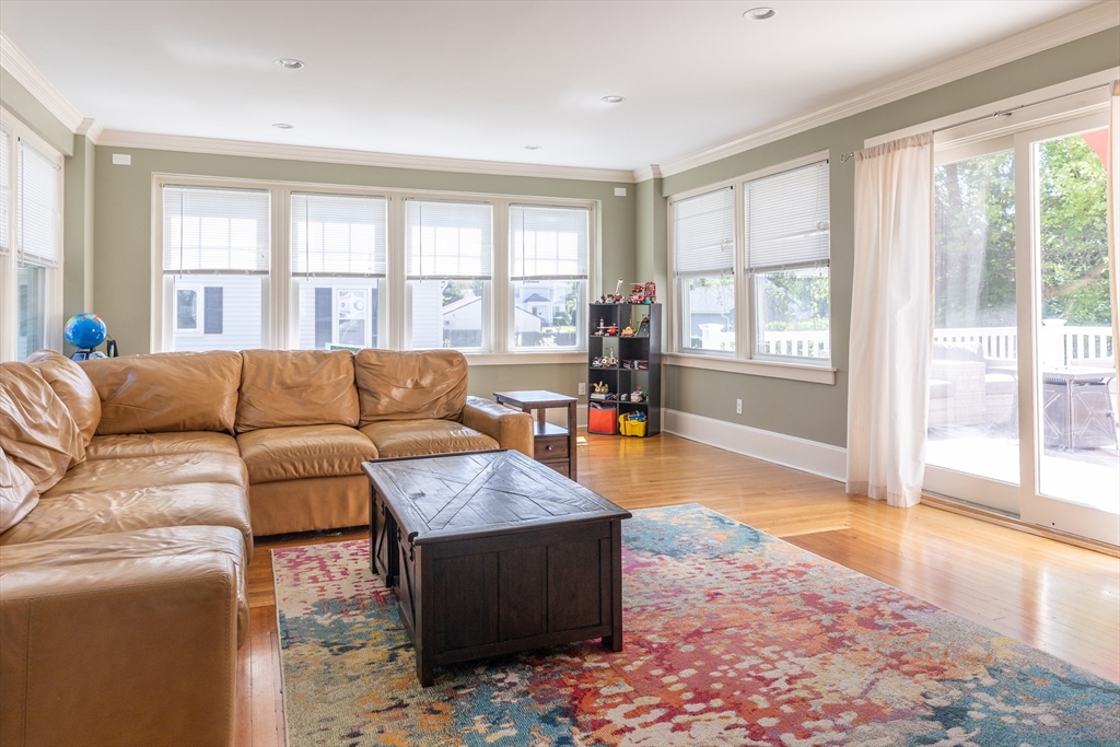 103 Maple Road Longmeadow, MA 01106 - Photo 12 of 35 a living room with furniture and a floor to ceiling window