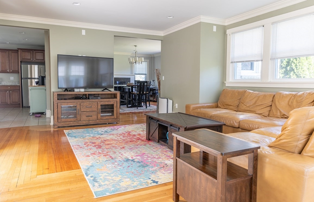 103 Maple Road Longmeadow, MA 01106 - Photo 13 of 35 a living room with furniture and a flat screen tv
