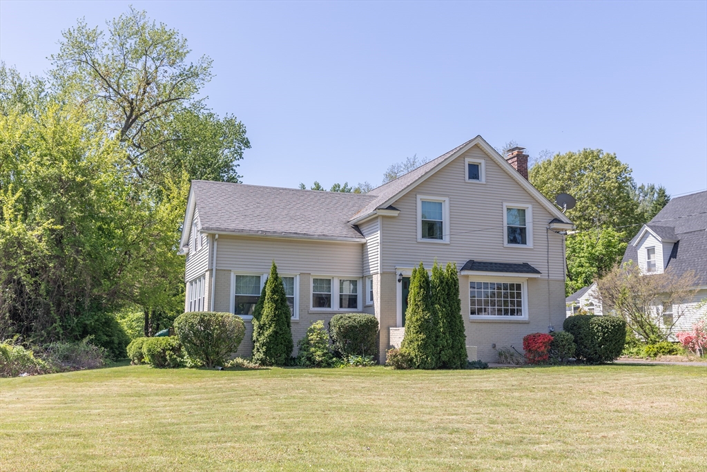103 Maple Road Longmeadow, MA 01106 - Photo 2 of 35 a front view of a house with a yard