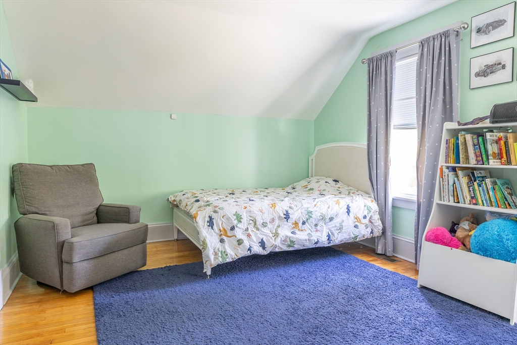 103 Maple Road Longmeadow, MA 01106 - Photo 30 of 35 a bedroom with a bed and a couch