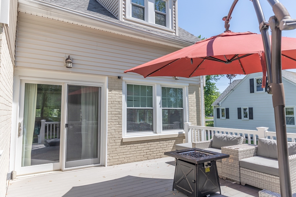 103 Maple Road Longmeadow, MA 01106 - Photo 6 of 35 a view of a house with backyard and sitting area
