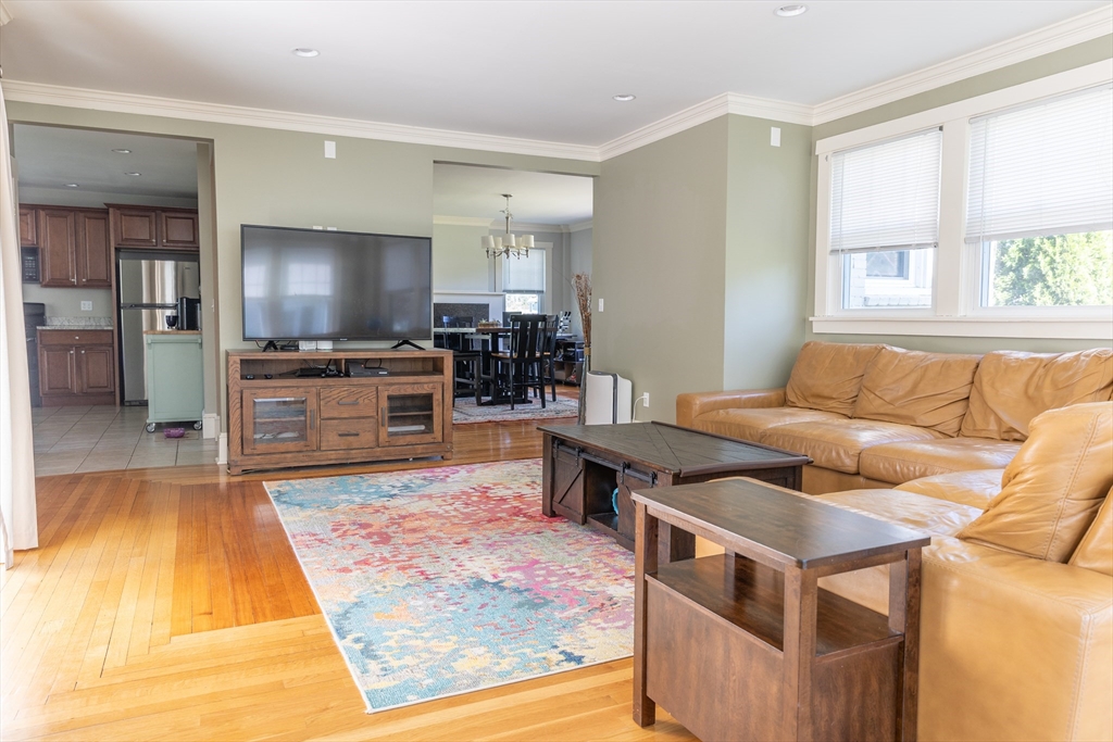 103 Maple Road Longmeadow, MA 01106 - Photo 10 of 35 a living room with furniture and a flat screen tv