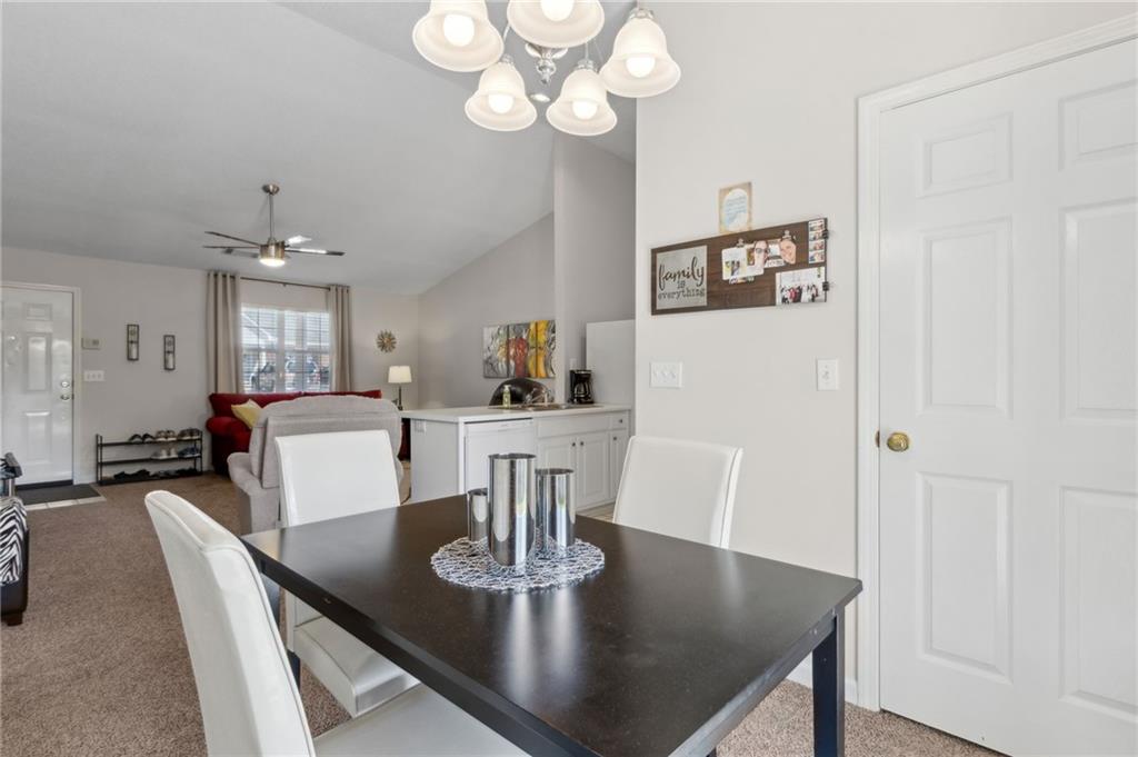 2905 Florence Drive Gainesville, GA 30504 - Photo 13 of 32 a view of a dining room with furniture and wooden floor