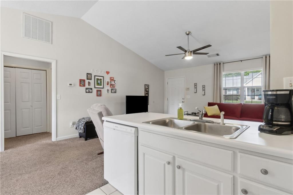 2905 Florence Drive Gainesville, GA 30504 - Photo 18 of 32 a living room with furniture and a fireplace