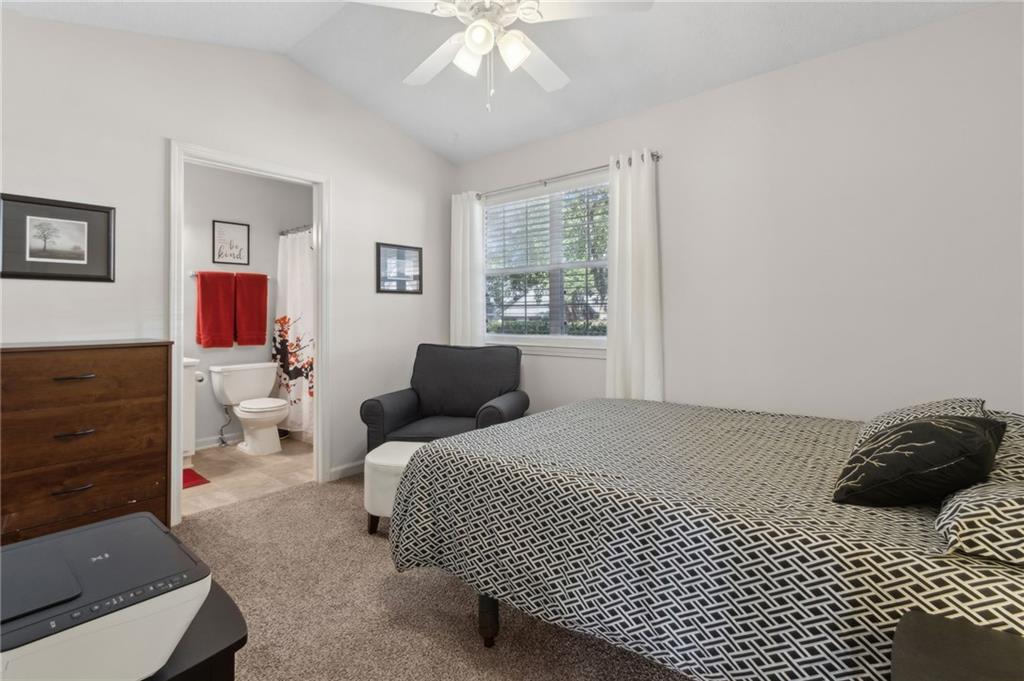 2905 Florence Drive Gainesville, GA 30504 - Photo 24 of 32 a bedroom with a bed and a dresser