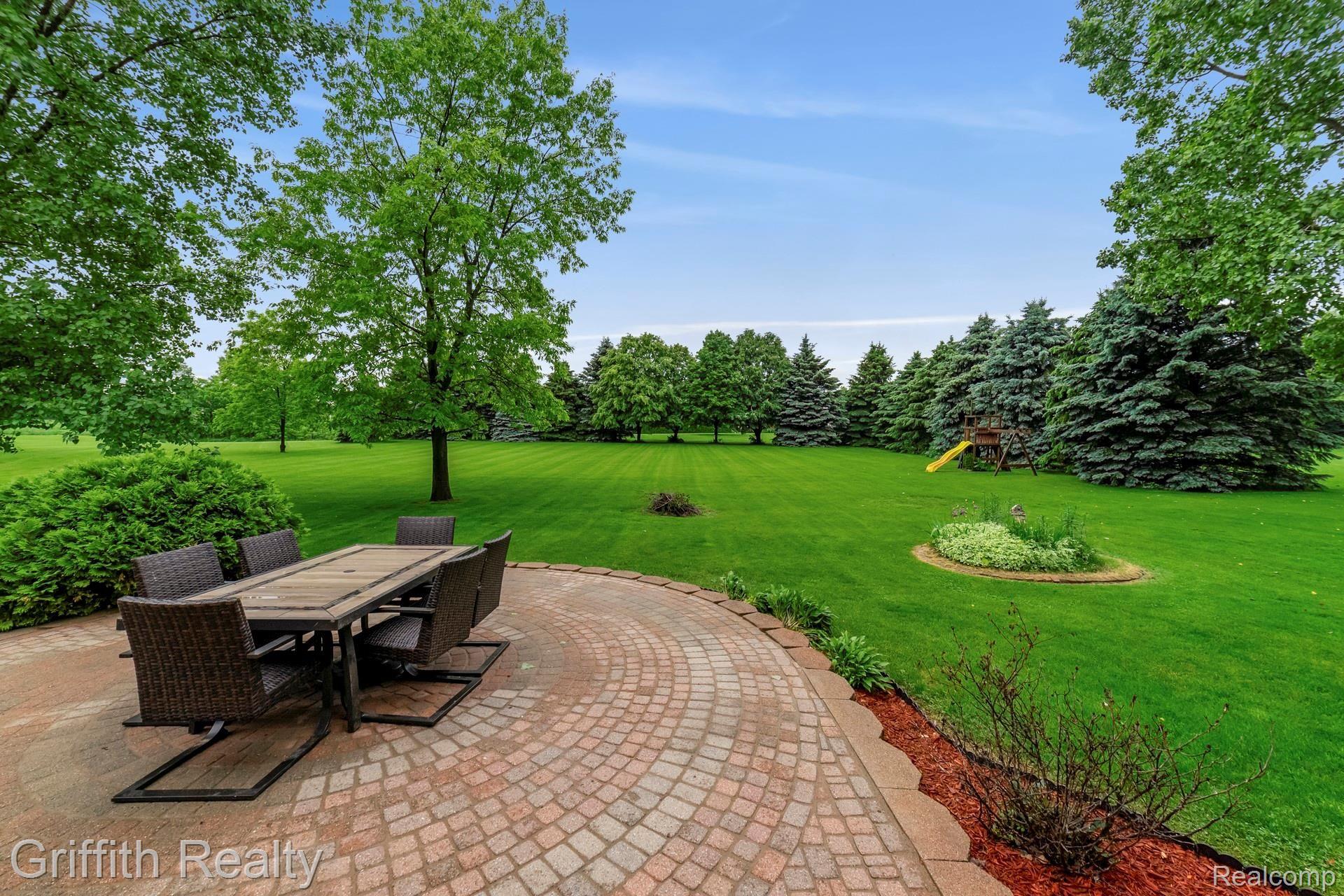 1899 Clover Ridge Drive Howell, MI 48843 - Photo 24 of 28 023-photo-patio-7163803.jpg
