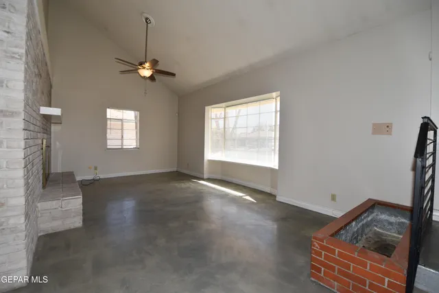 a kitchen with stainless steel appliances a stove top oven and cabinets