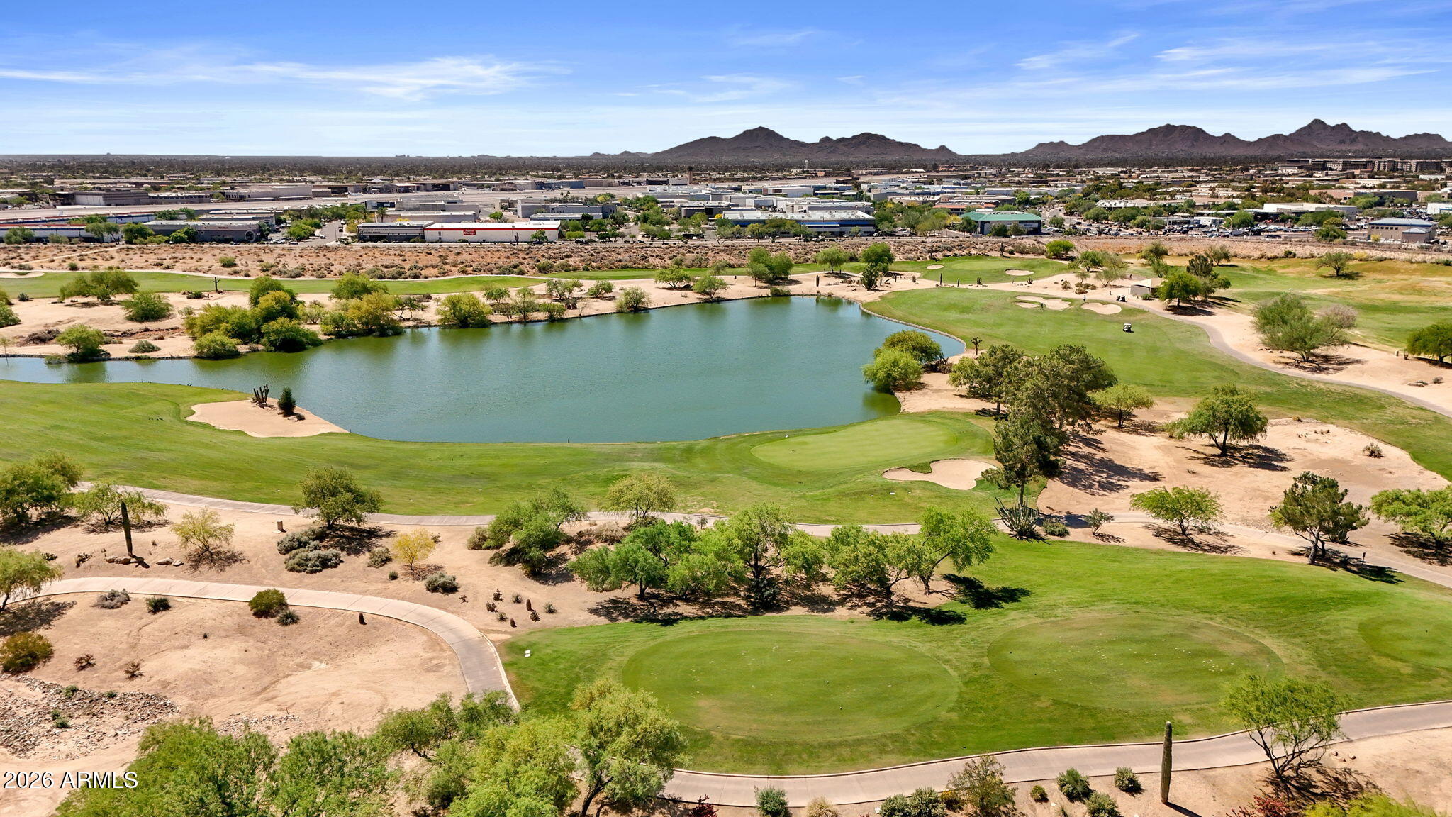 8245 East Bell Road, Unit 208 Scottsdale, AZ 85260 - Photo 11 of 48 an aerial view of residential houses with outdoor space