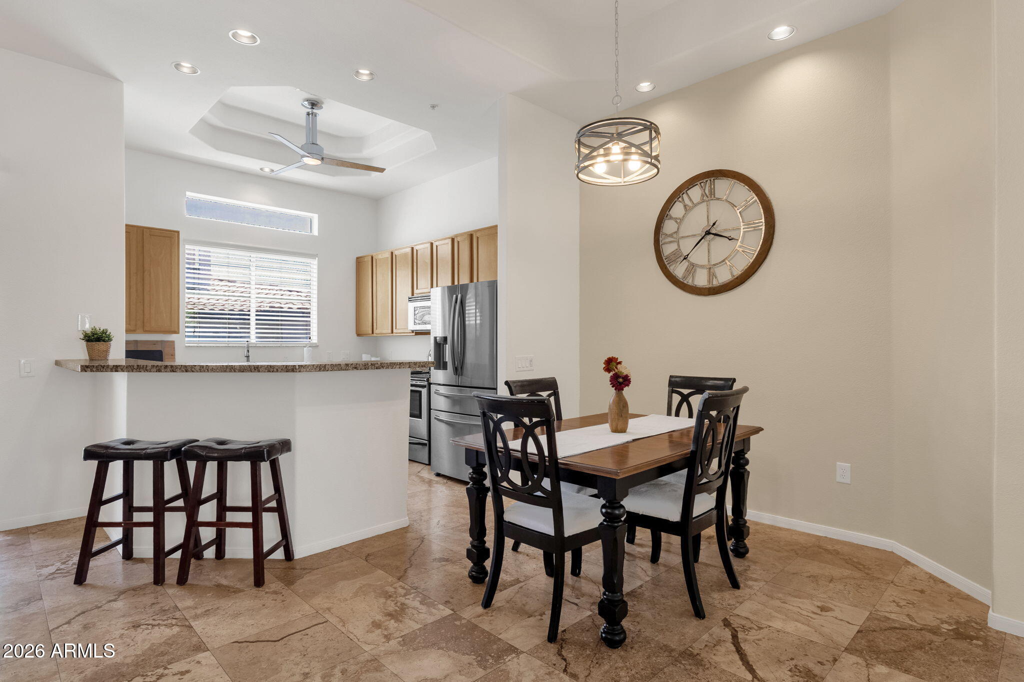 8245 East Bell Road, Unit 208 Scottsdale, AZ 85260 - Photo 3 of 46 Dining area & bar seating