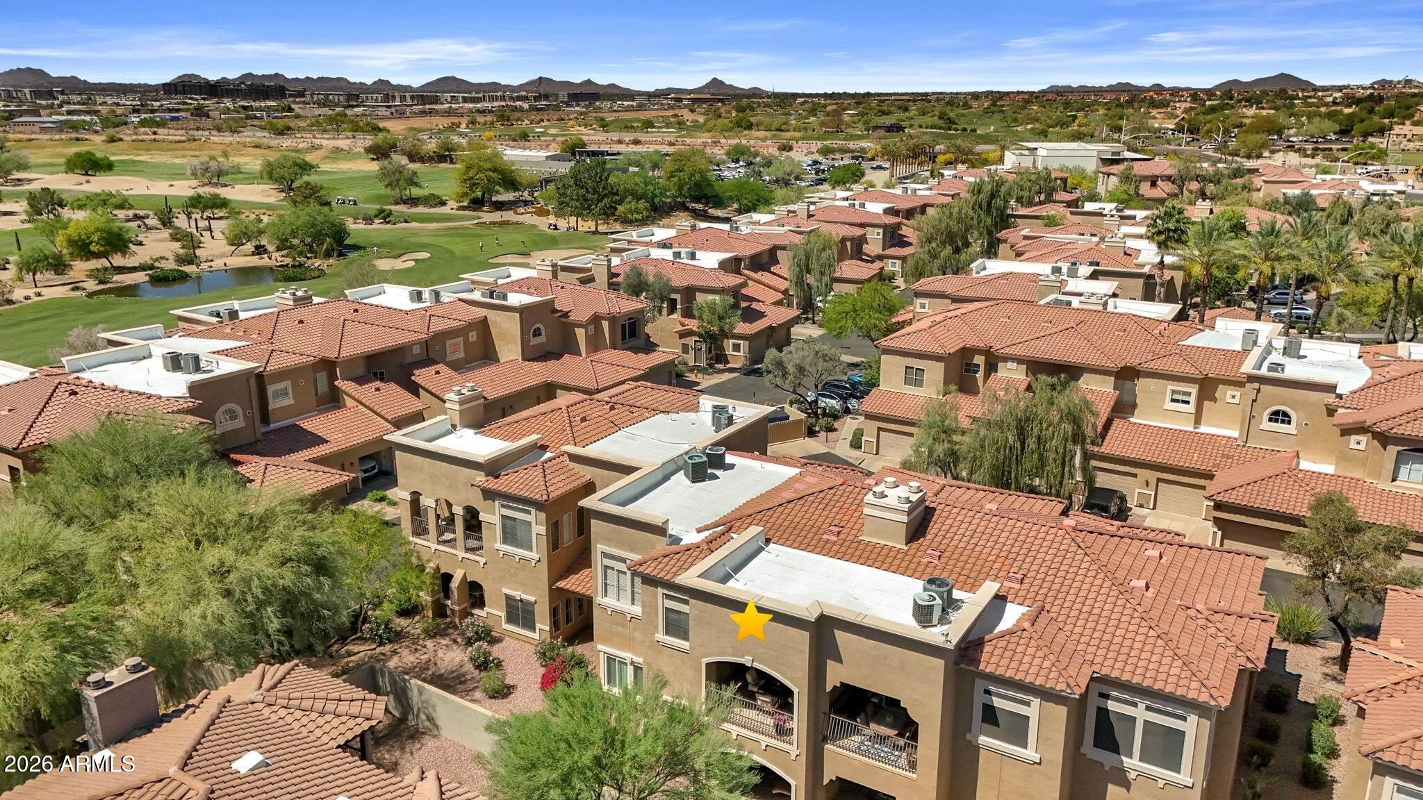 8245 East Bell Road, Unit 208 Scottsdale, AZ 85260 - Photo 42 of 48 an aerial view of a city with lots of residential buildings