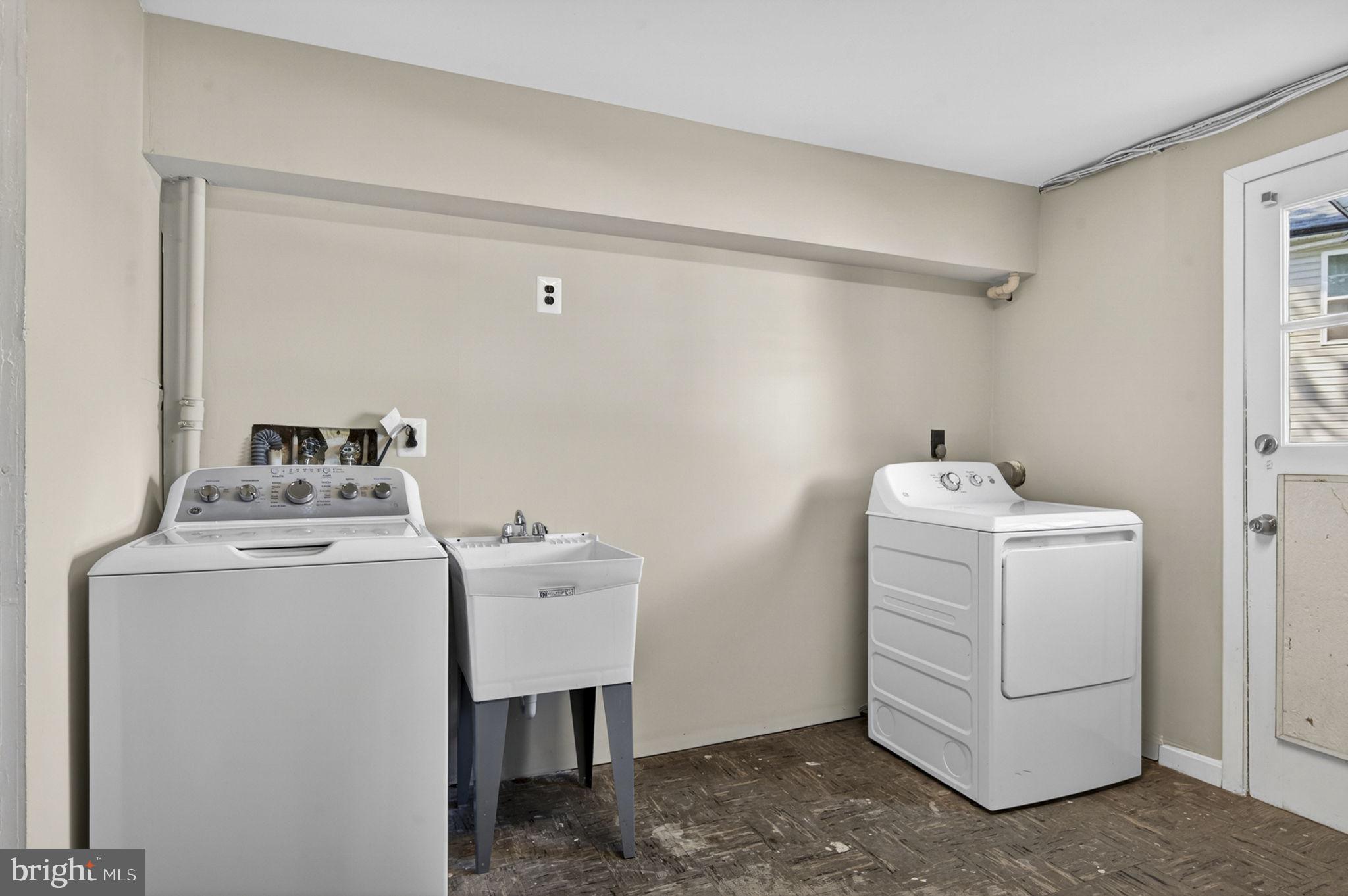 7505 Nottoway Place Springfield, VA 22150 - Photo 14 of 23 Bright and functional laundry space.