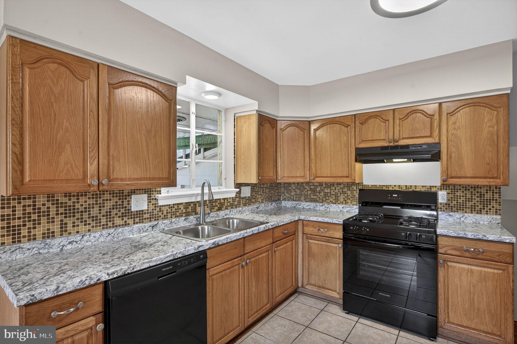 7505 Nottoway Place Springfield, VA 22150 - Photo 5 of 23 Charming kitchen with modern finishes.