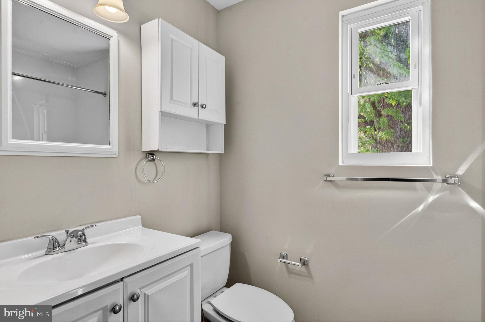 7505 Nottoway Place Springfield, VA 22150 - Photo 8 of 23 Bright and airy modern bathroom retreat.