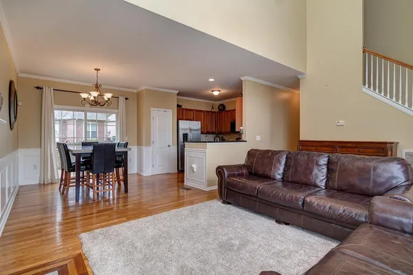 a view of kitchen with dining table and chairs