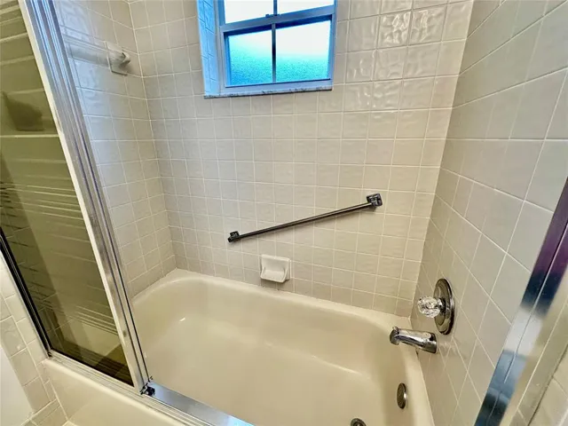 a view of a hallway with a couch