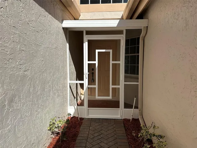 a view of a hallway with closet area