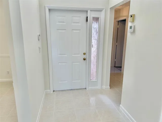 a bathroom with a sink mirror vanity and toilet