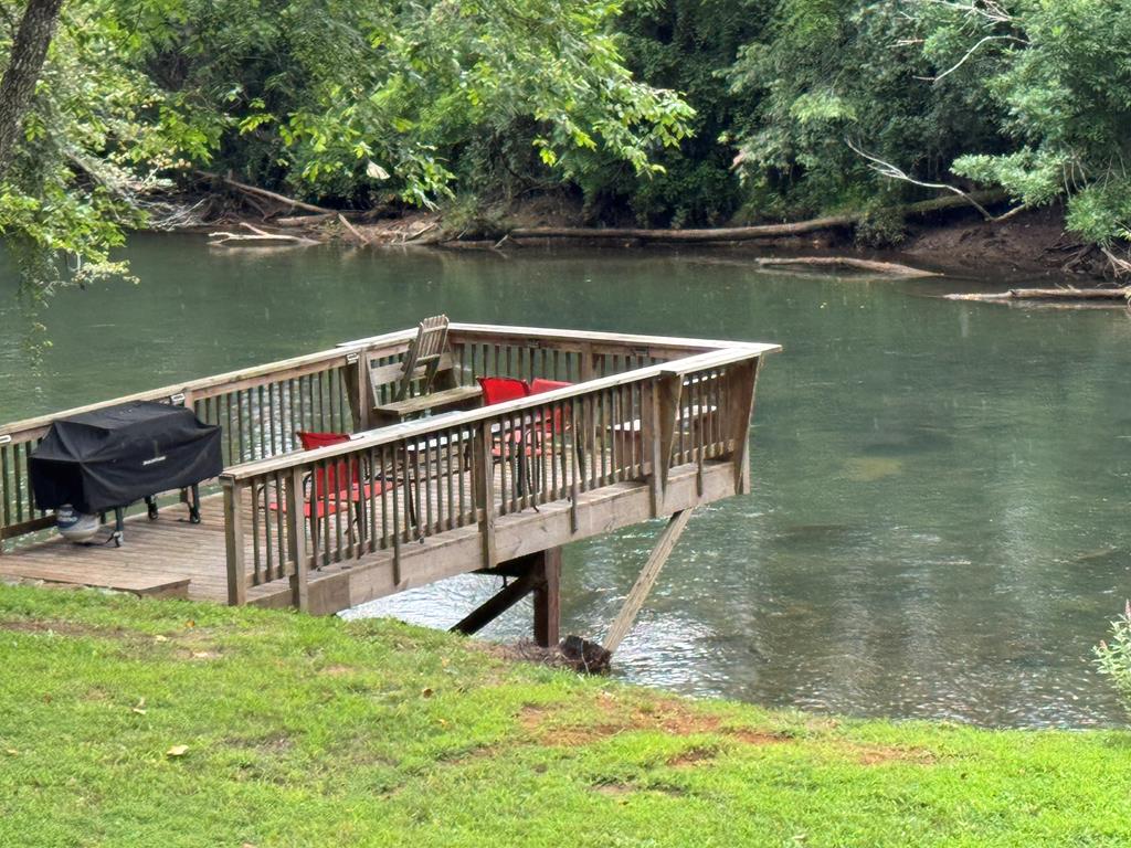 a view of a lake with a deck