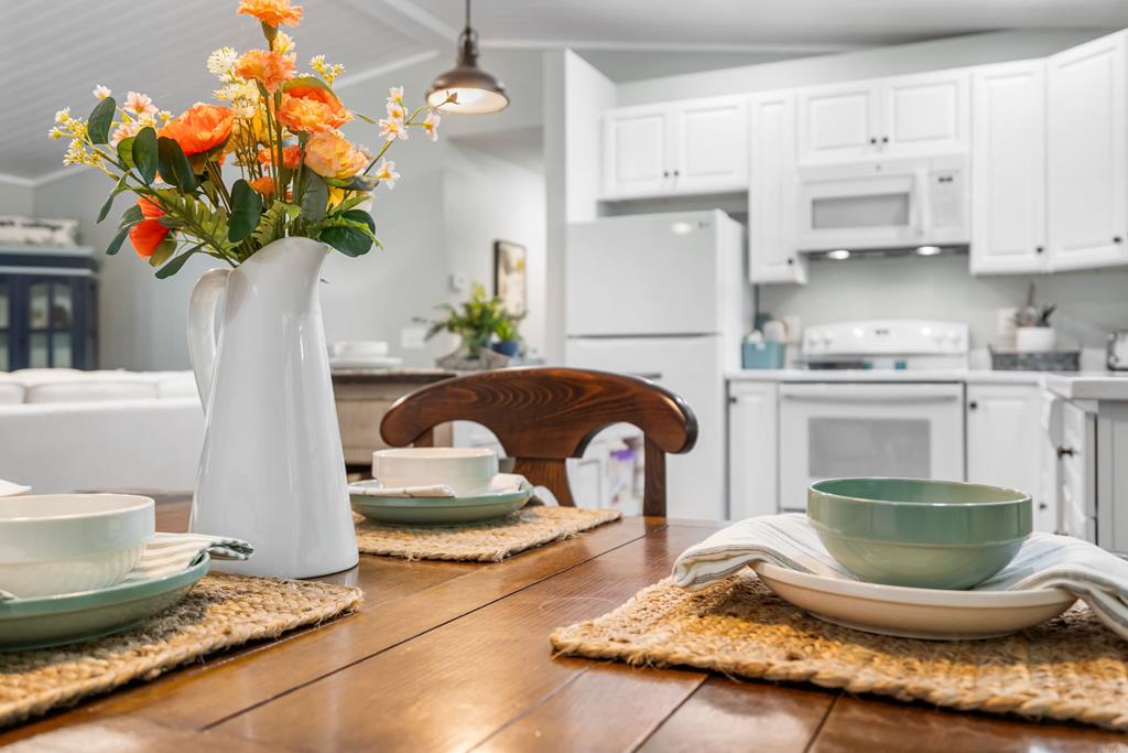 270 Hiawassee River Road Murphy, NC 28906 - Photo 12 of 50 a vase of flowers sitting on a table