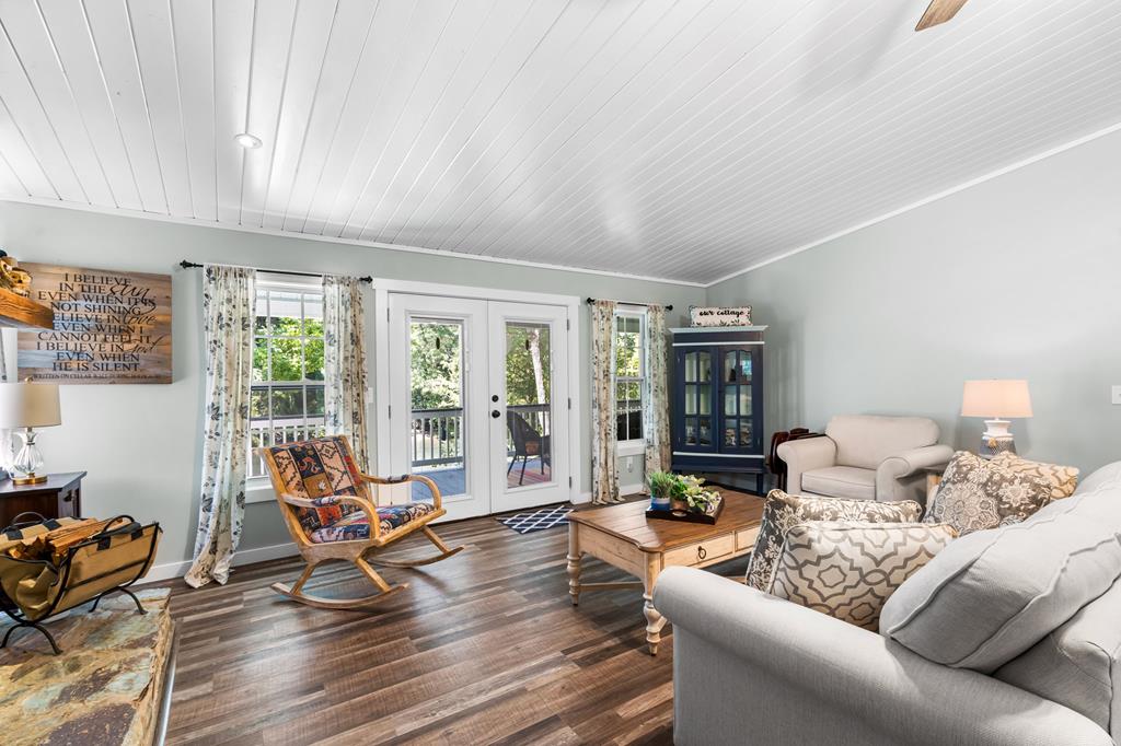 270 Hiawassee River Road Murphy, NC 28906 - Photo 17 of 50 a living room with furniture and wooden floor