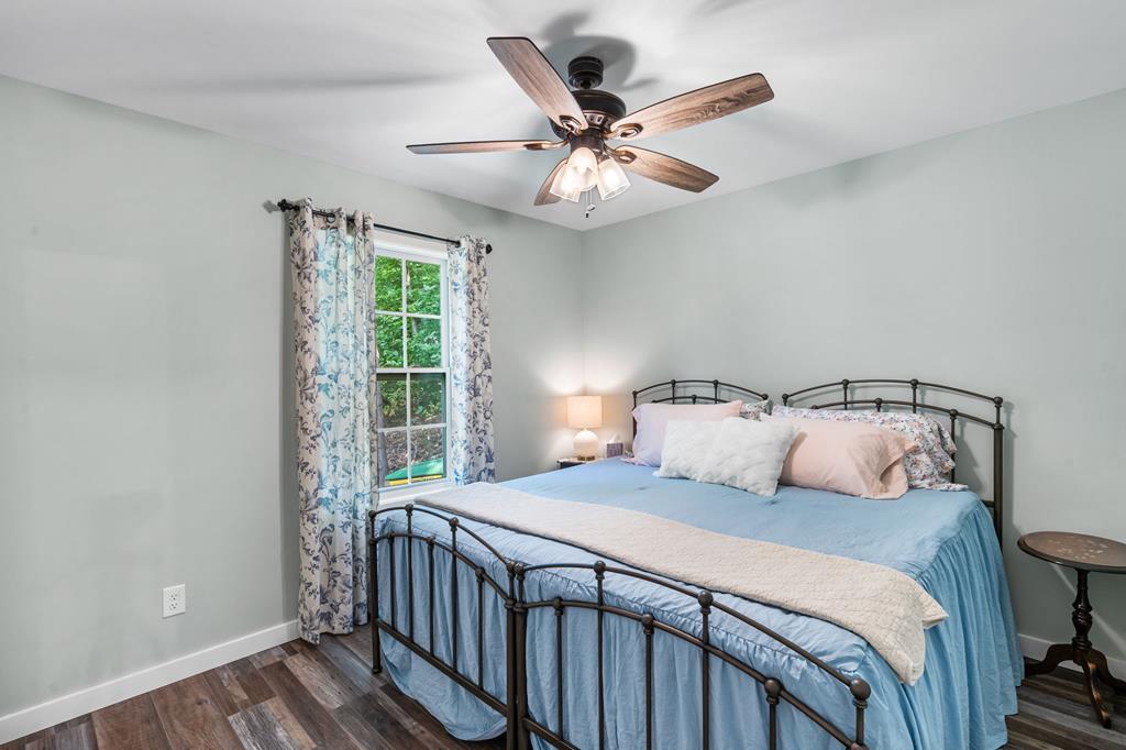 270 Hiawassee River Road Murphy, NC 28906 - Photo 20 of 50 a bedroom with a bed and a window