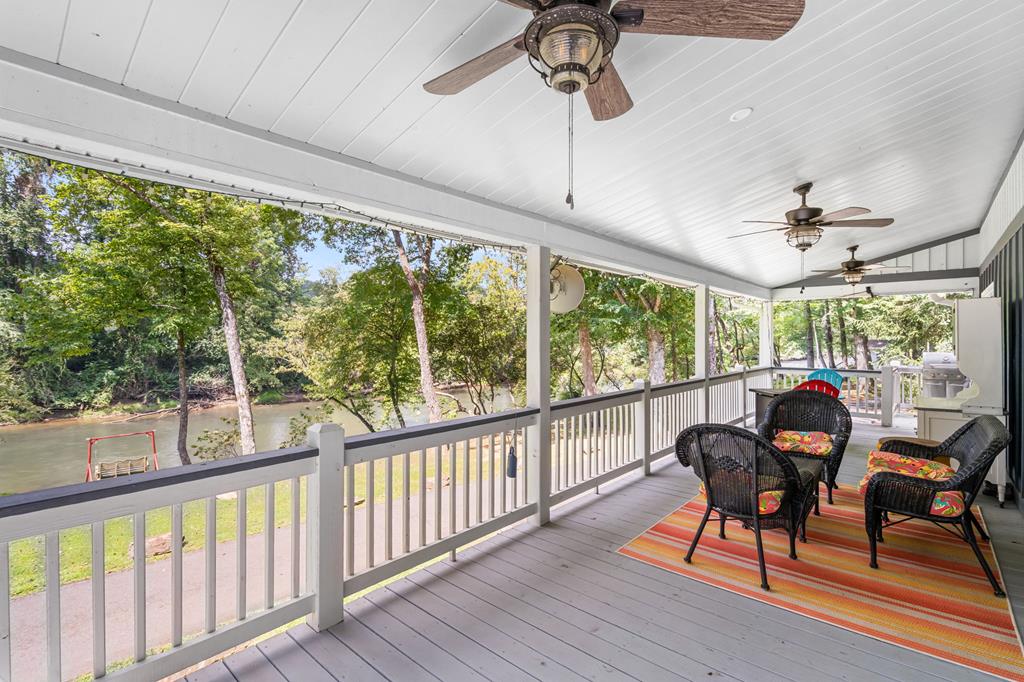 270 Hiawassee River Road Murphy, NC 28906 - Photo 27 of 50 a view of a dining room with furniture window and outside view