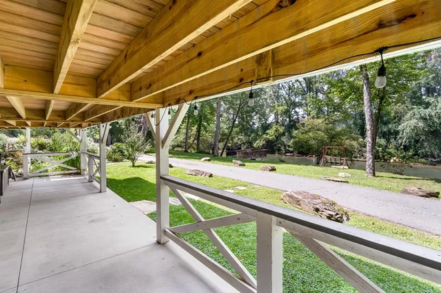 a view of a porch with a backyard