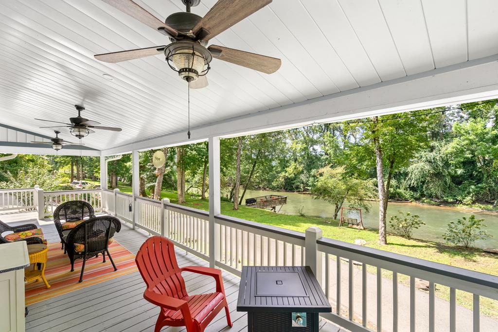 270 Hiawassee River Road Murphy, NC 28906 - Photo 30 of 50 a view of a porch with furniture and a yard