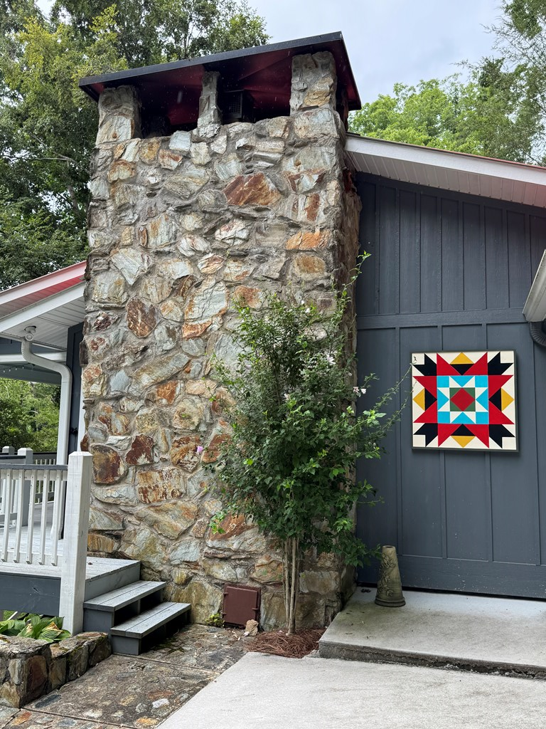 270 Hiawassee River Road Murphy, NC 28906 - Photo 5 of 50 a outdoor space with a couch