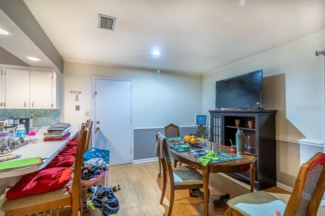 a room with furniture and a wooden floor