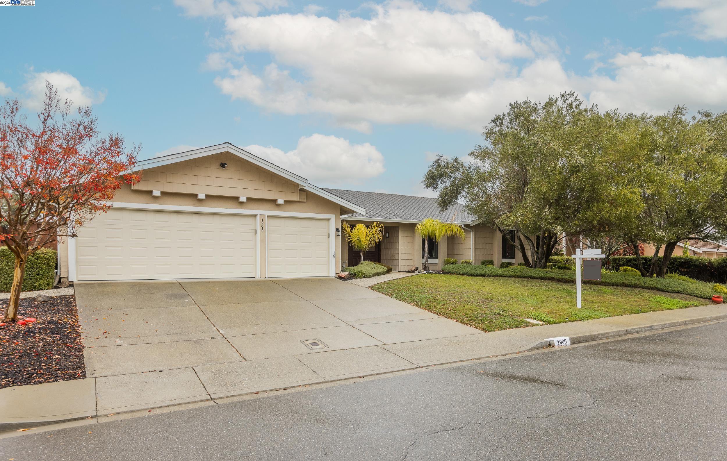 2906 Morgan Drive San Ramon, CA 94583 - Photo 1 of 1 a front view of a house with a yard and garage