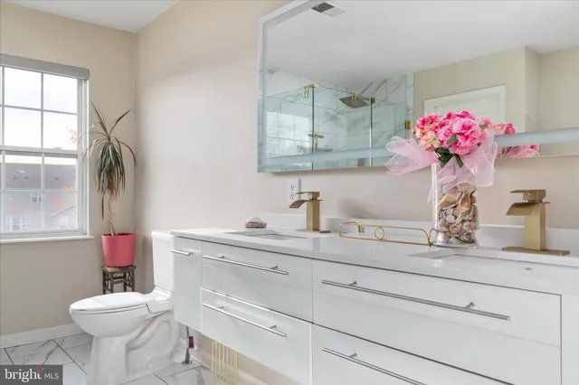 a bathroom sink with a mirror