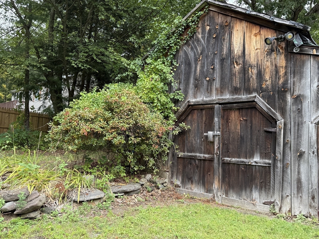 25 Basket Street Huntington, MA 01050 - Photo 2 of 8 a backyard of a house with lake view and a yard