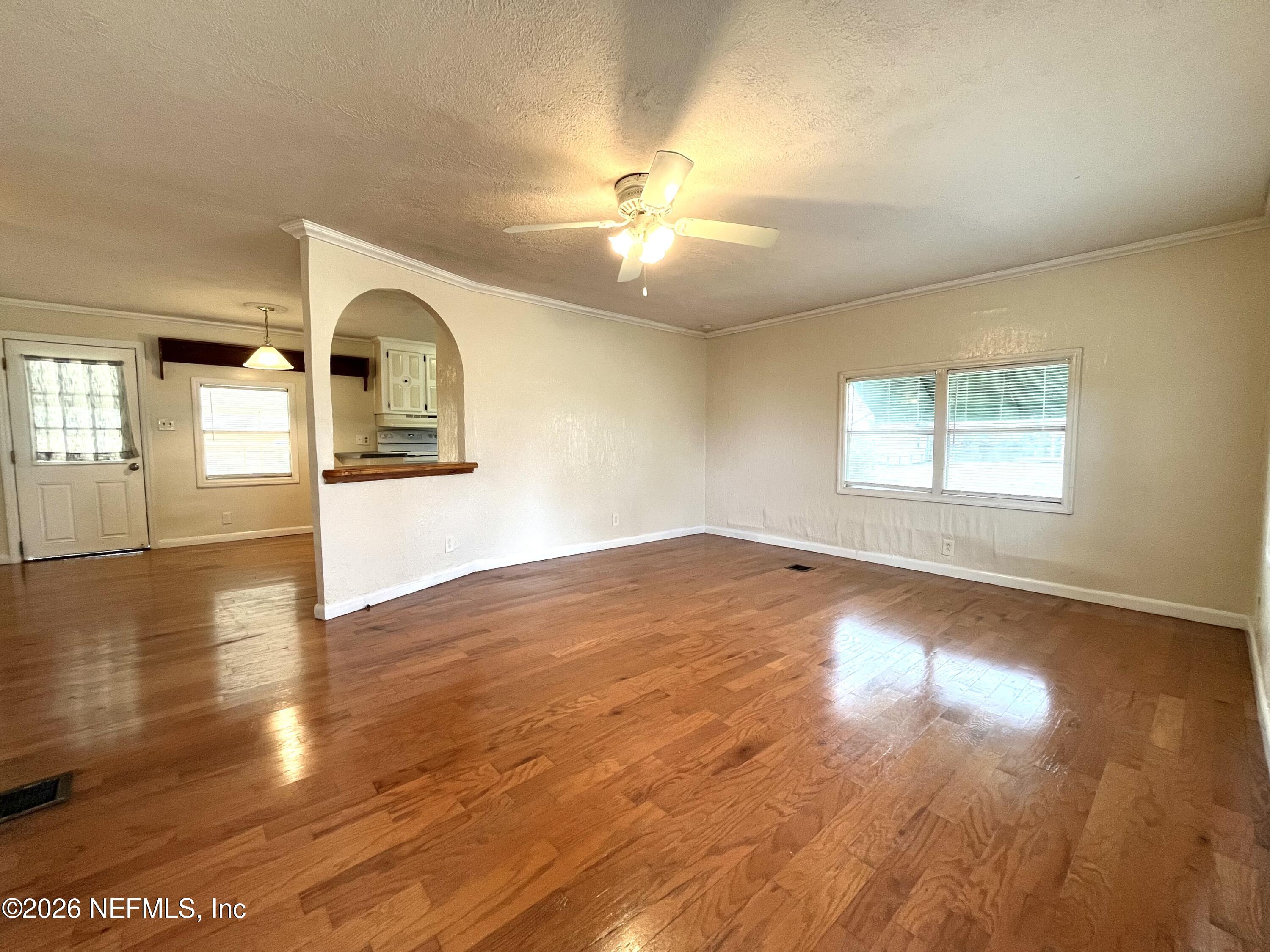 145 Magnolia Trail Satsuma, FL 32189 - Photo 12 of 20 a view of empty room with wooden floor