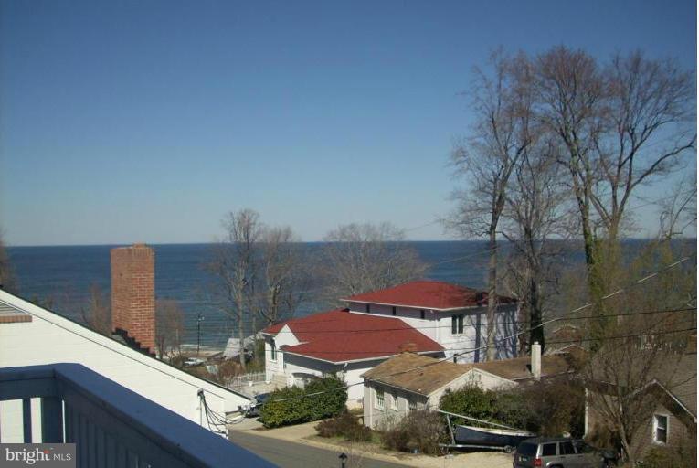 6037 Bayview Road St. Leonard, MD 20685 - Photo 2 of 24 View of Chesapeake Bay from Deck