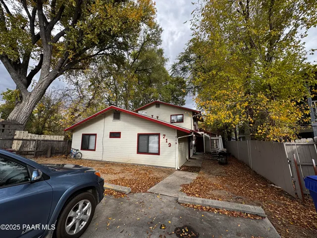 a car parked in front of a house