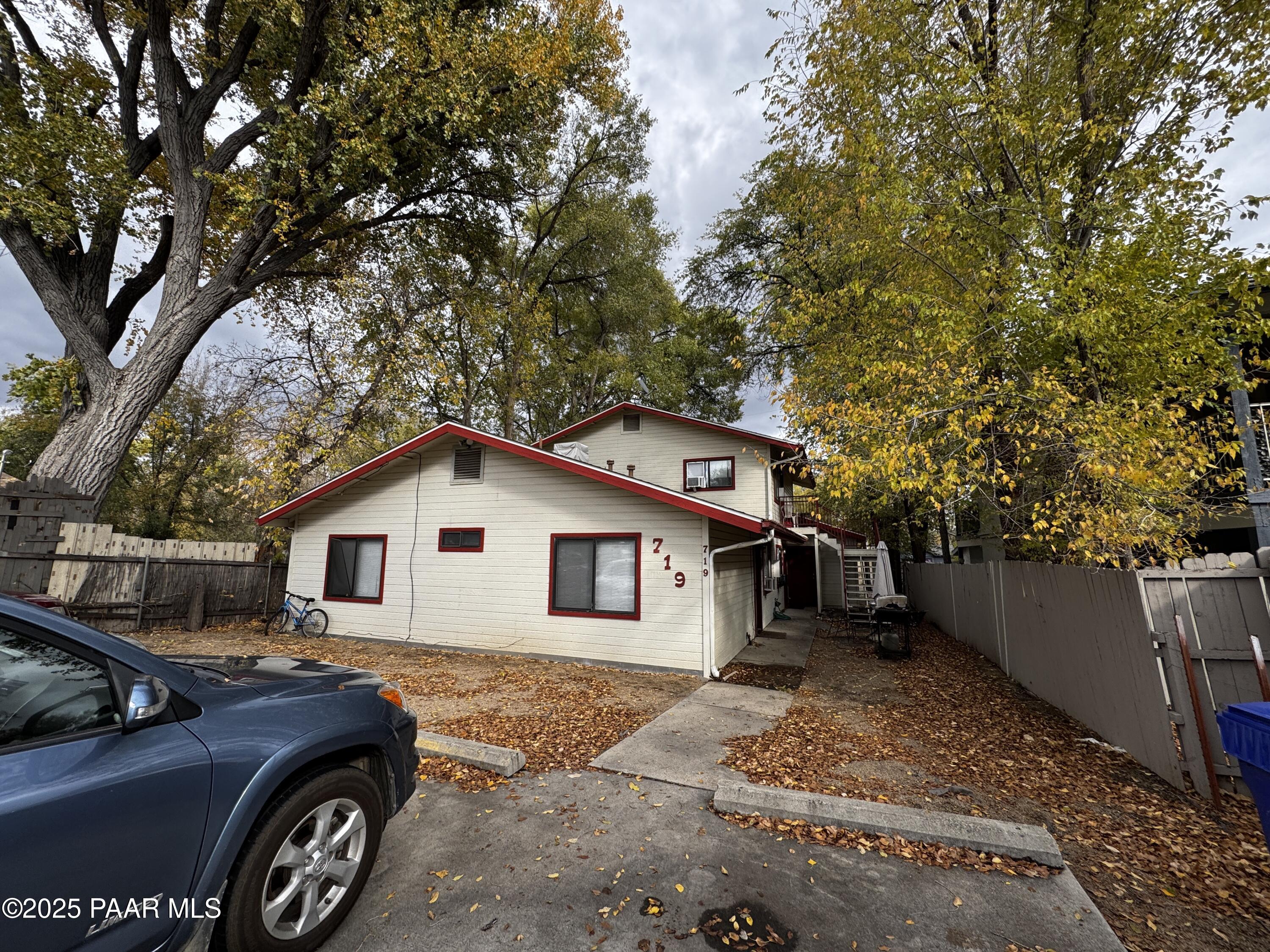 a car parked in front of a house