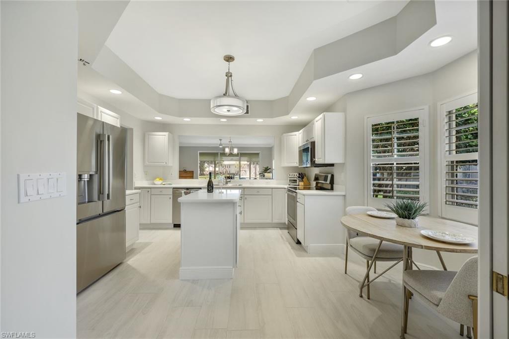 6240 Reserve Circle, Unit 802 Naples, FL 34119 - Photo 17 of 47 Eat-in area.