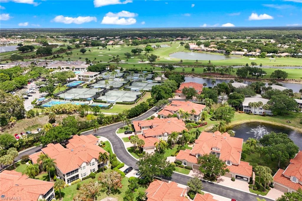 6240 Reserve Circle, Unit 802 Naples, FL 34119 - Photo 2 of 47 Steps to Vineyards Country Club. 6240 #202 is the center coach home in the photo.