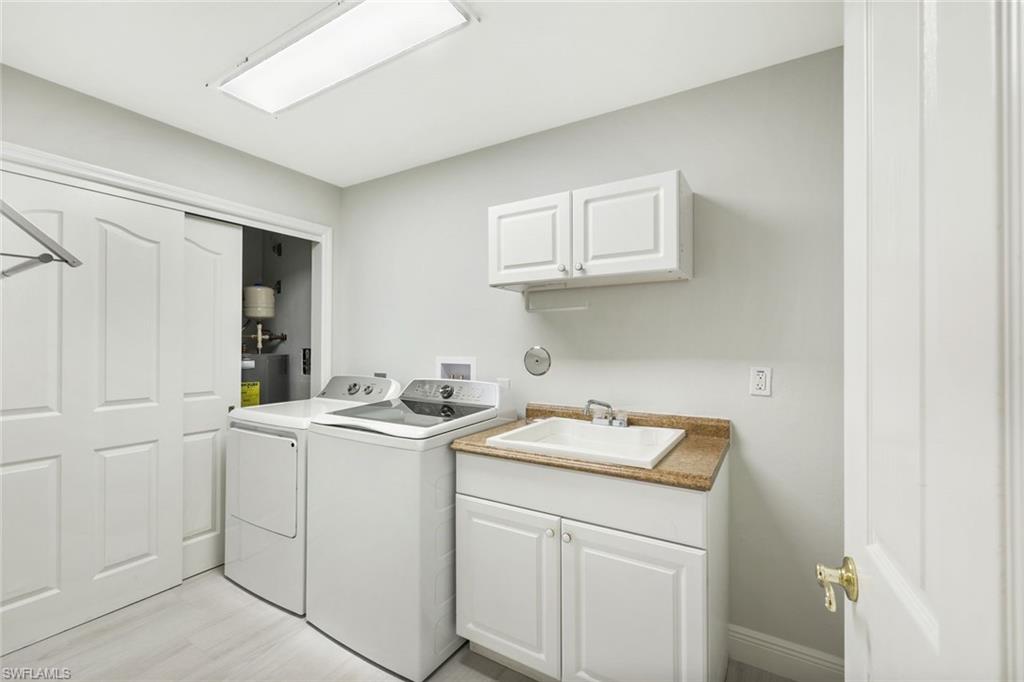 6240 Reserve Circle, Unit 802 Naples, FL 34119 - Photo 31 of 47 New washer & dryer.