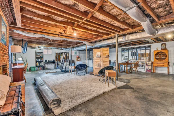 a view of a chairs and table in a room