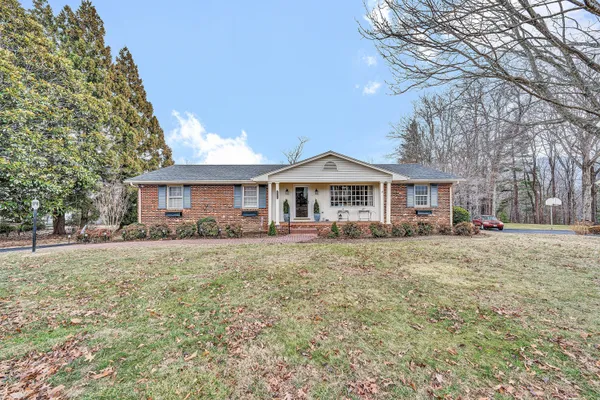 a front of a house with a yard