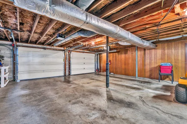 a view of a room with wooden walls