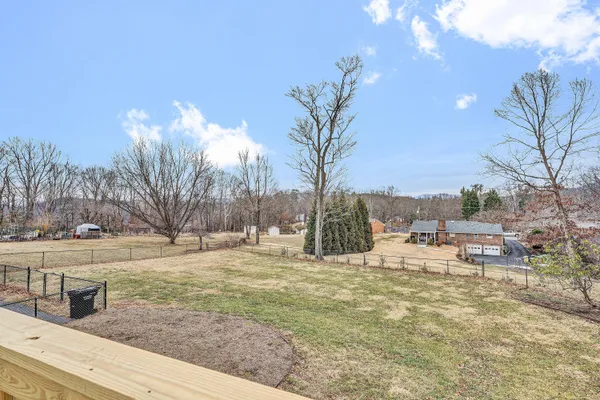 a view of a yard with a house