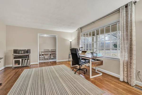 a workspace with wooden floor