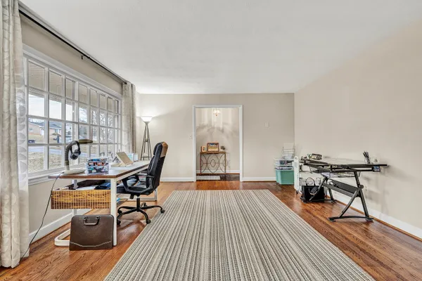a workspace with wooden floor