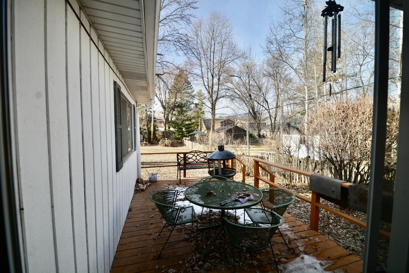609 North Loomis Street Naperville, IL 60563 - Photo 12 of 13 a wooden bench sitting in backside of a house