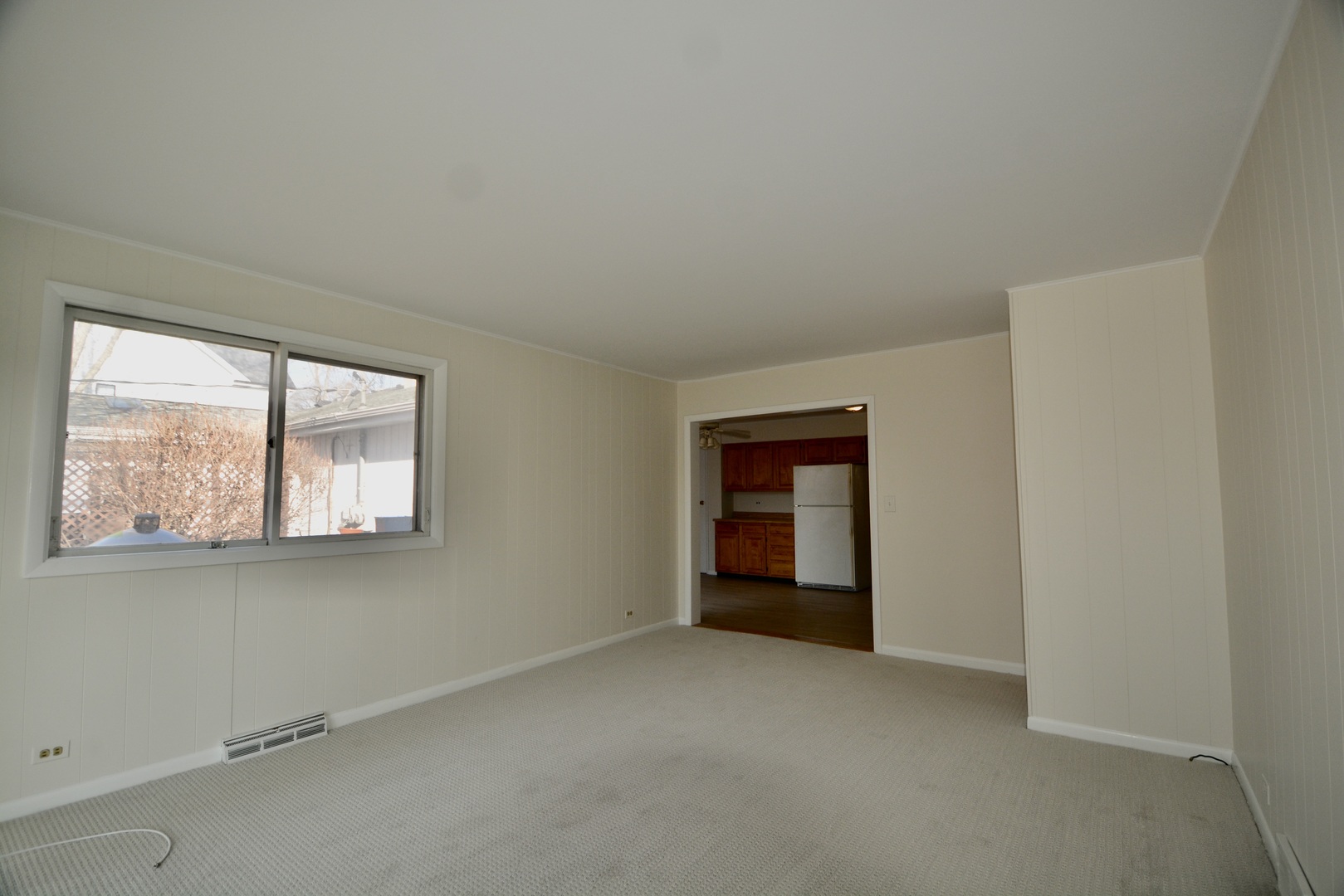 609 North Loomis Street Naperville, IL 60563 - Photo 4 of 13 an empty room with windows